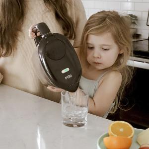 Dark PUR PPT710B pitcher being poured in a small manufacturer lifestyle photograph; code not visible in the crop.